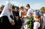 His Holiness Kirill Patriarch of Moscow and All Russia with inmates of Molnytsia orphanage