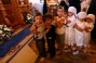 Orphanage inmates in the church honoring the icon “The Virgin of Consolation of all Sorrows”