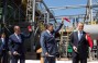 Prime-Minister of Crimea Anatoliy Moguilev, President of Ukraine Victor Yanukovych and Head of the Board of Directors of Group DF Dmitry Firtash at the ribbon cutting ceremony inaugurating the new sulfuric acid facility at “Krymskiy TITAN” plant