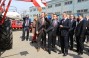 Andrey Nikolaenko, Pavel Shtutman and Dmitry Firtash inspect finished products manufactured on the plant